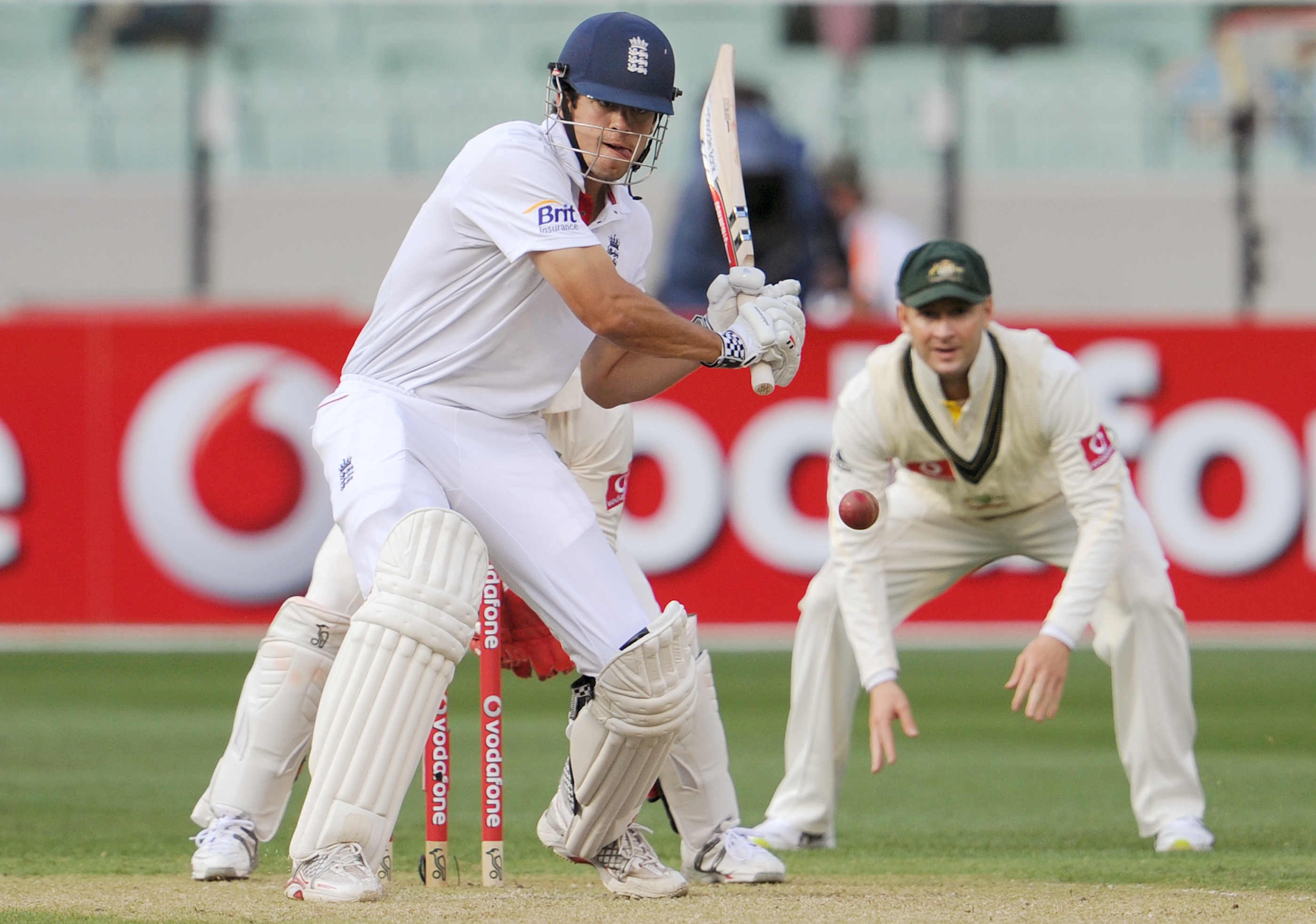 England batsman Alastair Cook (L) pulls