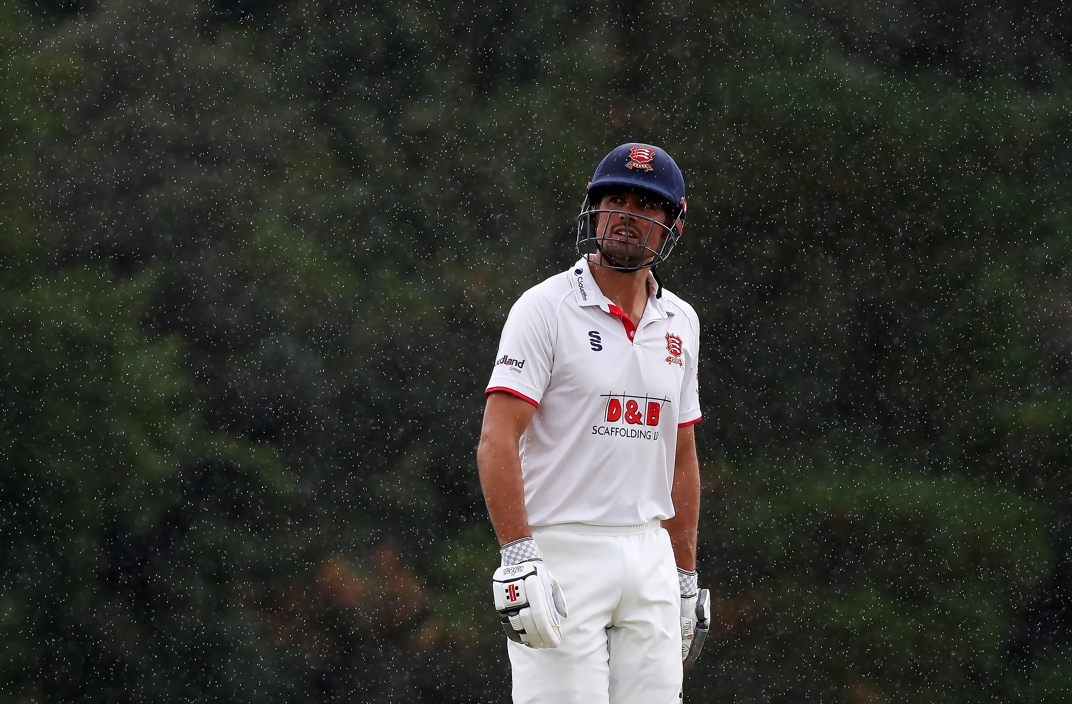 Alastair Cook of Essex looks skywards as the rain starts to fall again during Hampshire vs Essex in the Bob Willis Trophy at Arundel Castle Cricket Club on 23 August.